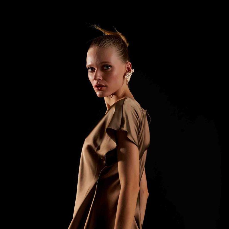 
                  
                    Full body view of model showcasing gold Auric Cuff Stud
                  
                