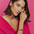 Model wearing Aurora Glow Bracelet in pink crystal gradient