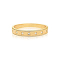 Gold bangle with double row of white zircon stones