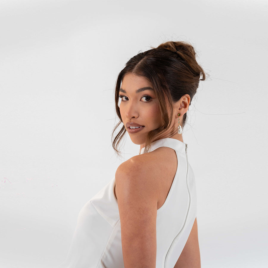 Model side view highlighting the halter neckline of the Milan Duo Set