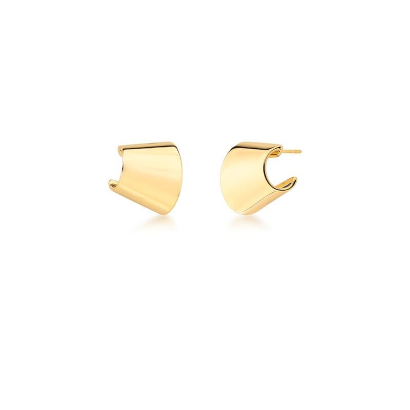 
                  
                    Close up of curved gold ear piercing on white background
                  
                