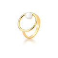 Gold-plated hollow round ring with central pearl shell accent on white background