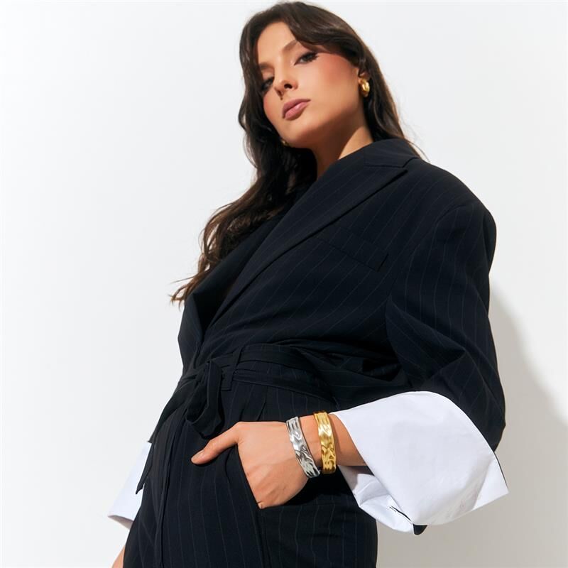 Model wearing Lunar Satin Bracelet with dark outfit