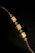 Lyra Bar Bracelet flat lay gold-plated chain with rectangular crystals