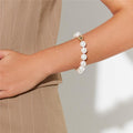 Magnet Pearl Bracelet with shell pearls worn on wrist