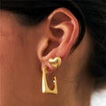 Satin Square Half Studs worn on model's ear