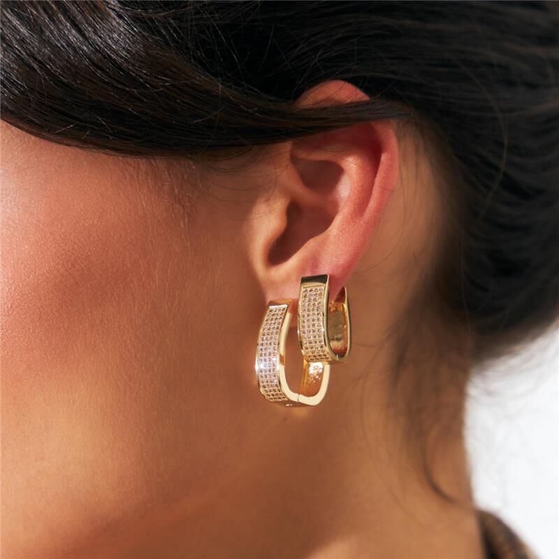 Stella Spark Hoops worn on ear close up